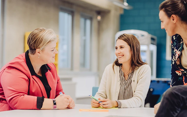 materialise employees discussing plan